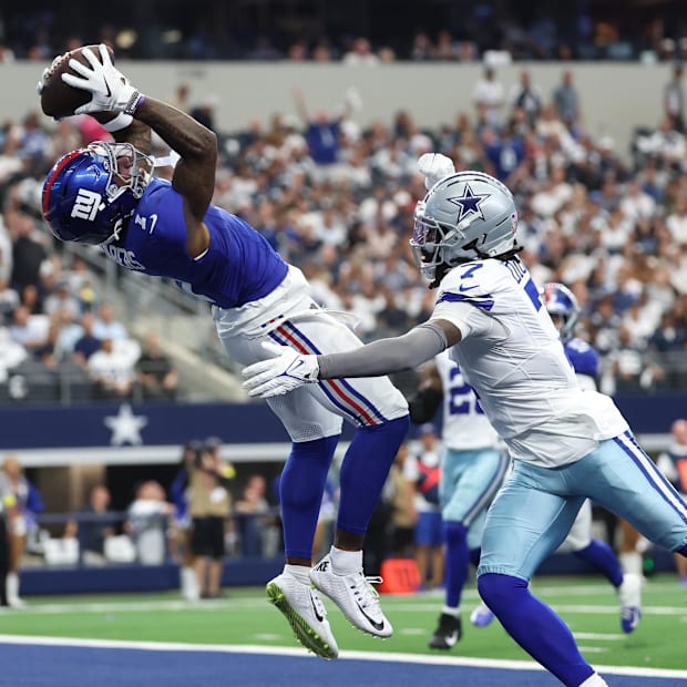 New York Giants wide receiver Malik Nabers makes a catch for a touchdown against Dallas Cowboys cornerback Trevon Diggs.