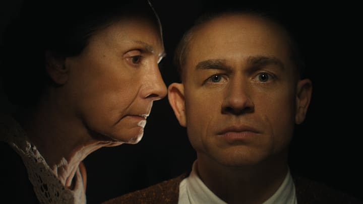 (L to R) Laurie Metcalf as Augusta Gein, Charlie Hunnam as Ed Gein in episode 307 of Monster: The Ed Gein Story