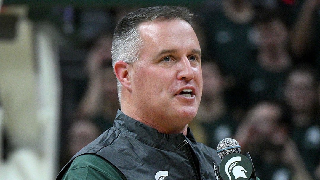 Dec 2, 2025; East Lansing, Michigan, USA;  Michigan State head football coach Pat Fitzgerald watches the Spartans defeat the Iowa Hawkeyes at Jack Breslin Student Events Center. Mandatory Credit: Dale Young-Imagn Images
