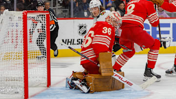 Nov 9, 2025; Detroit, Michigan, USA; Chicago Blackhawks left wing Tyler Bertuzzi (59) scores a goal on Detroit Red Wings goaltender John Gibson (36) during the third period at Little Caesars Arena. Mandatory Credit: Brian Bradshaw Sevald-Imagn Images