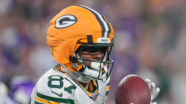 Dec 29, 2024; Minneapolis, Minnesota, USA; Green Bay Packers wide receiver Romeo Doubs (87) catches a pass against Minnesota Vikings in the second quarter at U.S. Bank Stadium. Mandatory Credit: Brad Rempel-Imagn Images