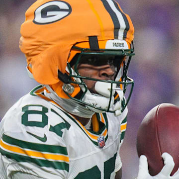 Green Bay Packers wide receiver Romeo Doubs (87) catches a pass against Minnesota Vikings.