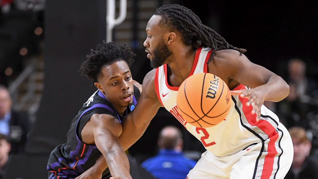 TCU Horned Frogs guard Jayden Pierre (1) defends Ohio State Buckeyes guard Bruce Thornton (2)