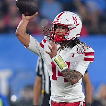 TJ Lateef throws against the UCLA Bruins during the first half at the Rose Bowl. 