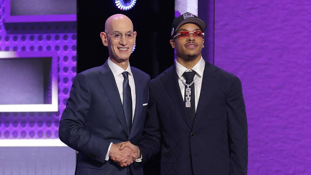 Jun 23, 2026; New York, NY, USA; NBA commissioner Adam Silver greets the seventh pick in the 2026 NBA draft, Arkansas guard Darius Acuff Jr. after he was selected by the Sacramento Kings at Barclays Center.