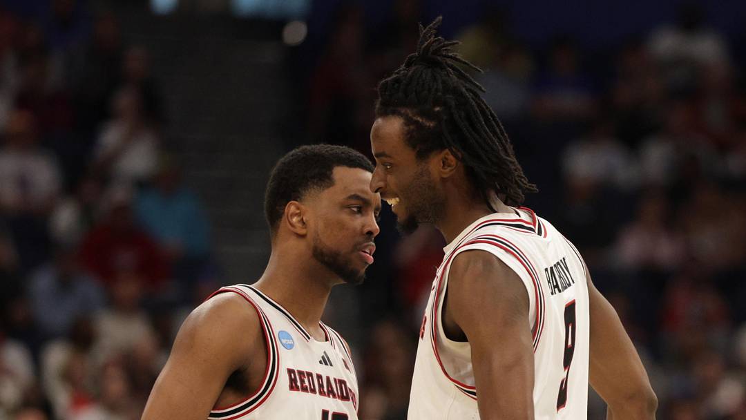 Mar 20, 2026; Tampa, FL, USA; Texas Tech Red Raiders forward Donovan Atwell (12) and forward Luke Bamgboye (9) celebrate in the second half against the Akron Zips during a first round game of the men's 2026 NCAA Tournament at Benchmark International Arena. Mandatory Credit: Nathan Ray Seebeck-Imagn Images