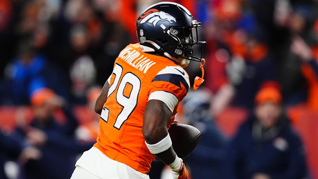 Jan 17, 2026; Denver, CO, USA; Denver Broncos cornerback Ja'quan McMillian (29) celebrates after intercepting a pass intended for Buffalo Bills wide receiver Brandin Cooks (not pictured) during overtime of an AFC Divisional Round playoff game at Empower Field at Mile High.