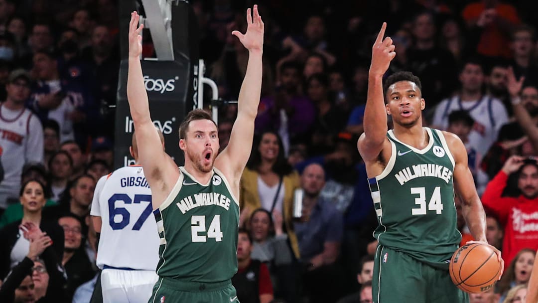 Nov 10, 2021; New York, New York, USA; Milwaukee Bucks guard Pat Connaughton (24) and forward Giannis Antetokounmpo (34) at Madison Square Garden. Mandatory Credit: Wendell Cruz-Imagn Images