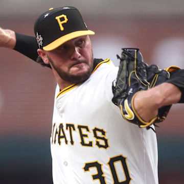 Jul 15, 2025; Cumberland, Georgia, USA; National League pitcher Paul Skenes (30) of the Pittsburgh Pirates pitches in the first inning against the American League during the 2025 MLB All Star Game at Truist Park. Mandatory Credit: Brett Davis-Imagn Images