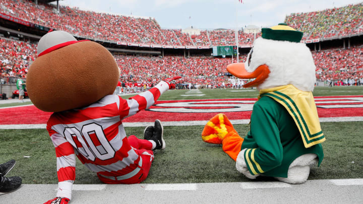 Brutus Buckeye and the Oregon Ducks mascot watch from the sideline during the first half of the NCAA football game at Ohio Stadium in Columbus on Saturday, Sept. 11, 2021.

Oregon Ducks At Ohio State Buckeyes Football