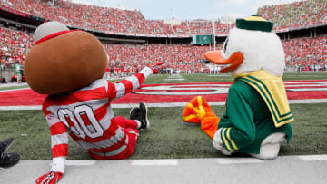 Brutus Buckeye and the Oregon Ducks mascot.