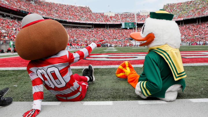 Brutus Buckeye and the Oregon Ducks mascot.