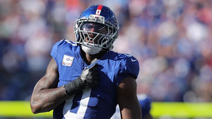 Sep 28, 2025; East Rutherford, New Jersey, USA; New York Giants linebacker Brian Burns (0) celebrates after sacking Los Angeles Chargers quarterback Justin Herbert (10) (not pictured) during the fourth quarter at MetLife Stadium.  