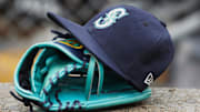 May 12, 2018; Detroit, MI, USA; Hat and glove of Seattle Mariners center fielder Dee Gordon (9) sits in dugout during the third inning against the Detroit Tigers at Comerica Park. 