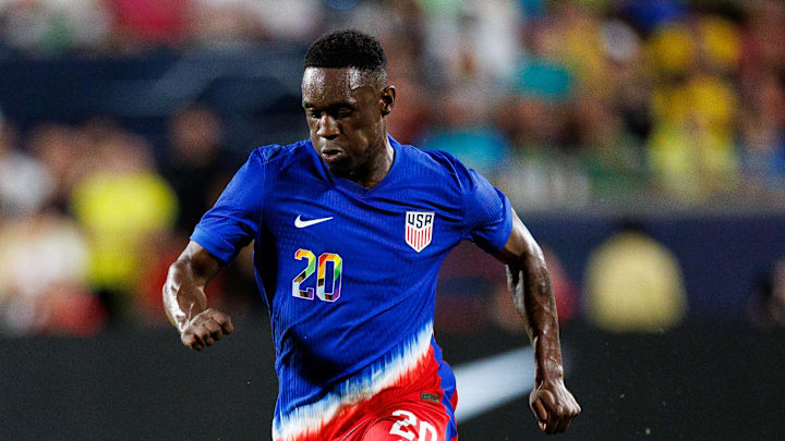 Jun 12, 2024; Orlando, Florida, USA;  United States forward Folarin Balogun (20) controls the ball against Brazil in the second half during the Continental Clasico at Camping World Stadium. 
