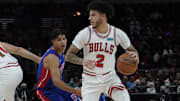 Oct 23, 2021; Chicago, Illinois, USA; Chicago Bulls guard Lonzo Ball (2) looks to pass against the Detroit Pistons during the first half at United Center. Mandatory Credit: David Banks-Imagn Images