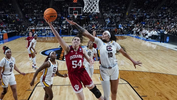 Mar 29, 2024; Albany, NY, USA; Indiana Hoosiers forward Mackenzie Holmes (54) shoots a layup against South Carolina center Kamilla Cardoso.