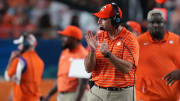 Dec 30, 2022; Miami Gardens, FL, USA; Clemson Tigers head coach Dabo Swinney gestures from the sideline during the second half of the 2022 Orange Bowl against the Tennessee Volunteers at Hard Rock Stadium.