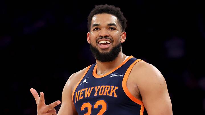 Mar 17, 2025; New York, New York, USA; New York Knicks center Karl-Anthony Towns (32) celebrates his three point shot against the Miami Heat during the second quarter at Madison Square Garden. Mandatory Credit: Brad Penner-Imagn Images