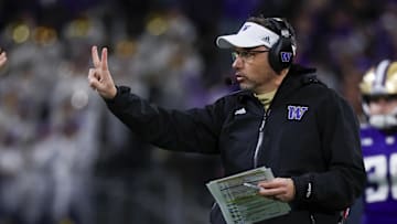 Nov 2, 2024; Seattle, Washington, USA; Washington Huskies head coach Jedd Fisch signals for a two-point conversion try against the USC Trojans following a touchdown during the fourth quarter at Alaska Airlines Field at Husky Stadium. Mandatory Credit: Joe Nicholson-Imagn Images