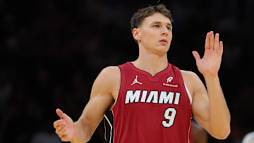 Nov 7, 2025; Miami, Florida, USA; Miami Heat guard Pelle Larsson (9) reacts after scoring against the Charlotte Hornets during the first quarter of an NBA Cup game at Kaseya Center. Mandatory Credit: Sam Navarro-Imagn Images