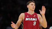 Nov 7, 2025; Miami, Florida, USA; Miami Heat guard Pelle Larsson (9) reacts after scoring against the Charlotte Hornets during the first quarter of an NBA Cup game at Kaseya Center. Mandatory Credit: Sam Navarro-Imagn Images