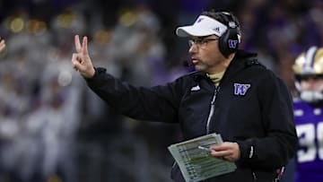 Nov 2, 2024; Seattle, Washington, USA; Washington Huskies head coach Jedd Fisch signals for a two-point conversion try against the USC Trojans following a touchdown during the fourth quarter at Alaska Airlines Field at Husky Stadium. Mandatory Credit: Joe Nicholson-Imagn Images