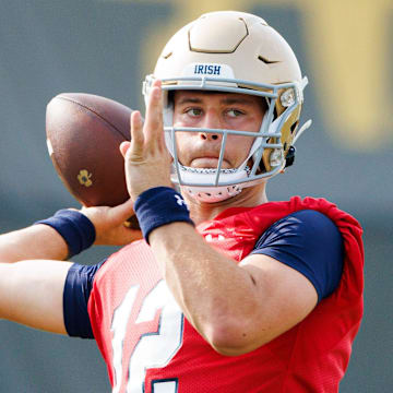 Notre Dame quarterback CJ Carr throws the ball during a Notre Dame football practice at Irish Athletic Center on Wednesday, July 31, 2024, in South Bend.