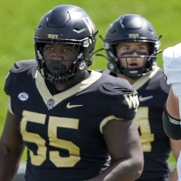 Sep 9, 2023; Winston-Salem, North Carolina, USA;  Wake Forest Demon Deacons defensive lineman Bryce Ganious (55) during the second quarter at Allegacy Federal Credit Union Stadium. Mandatory Credit: Jim Dedmon-Imagn Images
