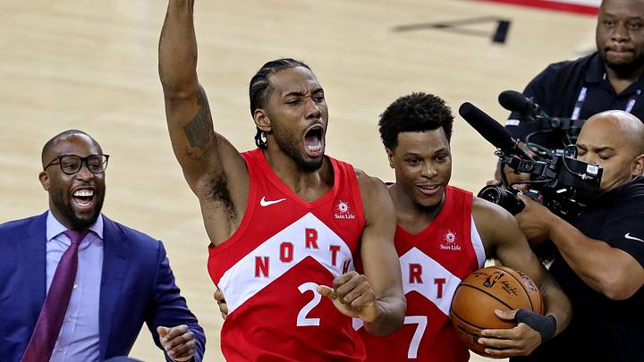 Jun 13, 2019; Oakland, CA, USA; Toronto Raptors forward Kawhi Leonard (2) and Toronto Raptors guard Kyle Lowry (7) celebrate winning the NBA Championship over the Golden State Warriors against game six of the 2019 NBA Finals at Oracle Arena. Mandatory Credit: Sergio Estrada-USA TODAY Sports