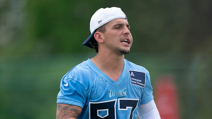 Tennessee Titans receiver Xavier Restrepo finishes up practice during OTAs. Tennessee Titans receiver Xavier Restrepo finishes up practice during OTAs.