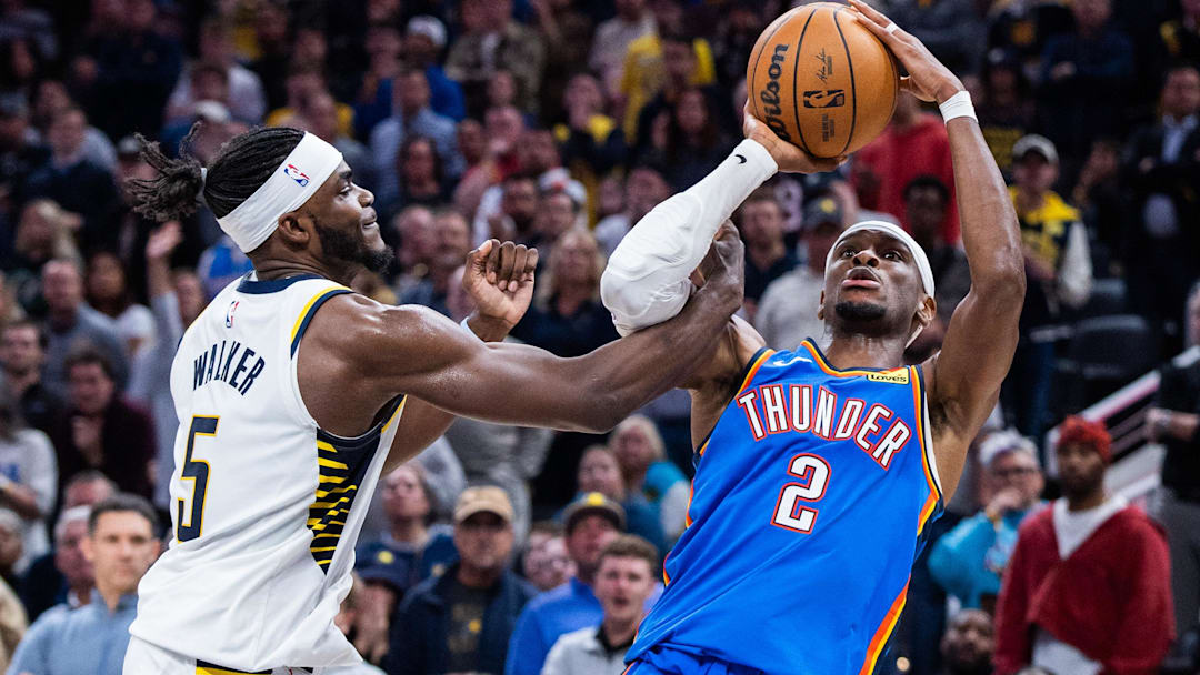 Oct 23, 2025; Indianapolis, Indiana, USA; Oklahoma City Thunder guard Shai Gilgeous-Alexander (2) shoots the ball while Indiana Pacers forward Jarace Walker (5) defends in the second half at Gainbridge Fieldhouse. Mandatory Credit: Trevor Ruszkowski-Imagn Images Oct 23, 2025; Indianapolis, Indiana, USA; Oklahoma City Thunder guard Shai Gilgeous-Alexander (2) shoots the ball while Indiana Pacers forward Jarace Walker (5) defends in the second half at Gainbridge Fieldhouse. Mandatory Credit: Trevor Ruszkowski-Imagn Images