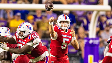 Sep 6, 2025; Baton Rouge, Louisiana, USA;  Louisiana Tech Bulldogs quarterback Blake Baker (5) passes against LSU Tigers during the second half  at Tiger Stadium. Mandatory Credit: Stephen Lew-Imagn Images