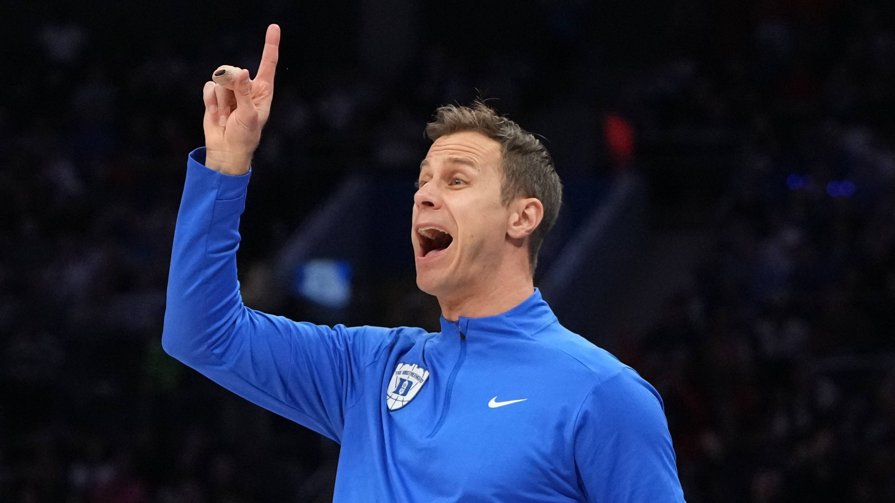 Mar 14, 2026; Charlotte, NC, USA; Duke Blue Devils head coach Jon Scheyer reacts in the first half during the men's ACC Conference Tournament Championship at Spectrum Center. Mandatory Credit: Bob Donnan-Imagn Images
