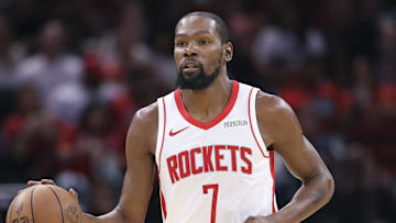 Oct 8, 2025; Houston, Texas, USA; Houston Rockets forward Kevin Durant (7) brings the ball up the court during the third quarter against the Utah Jazz at Toyota Center. Mandatory Credit: Troy Taormina-Imagn Images