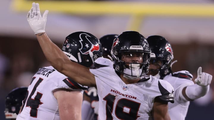 The Houston Texans Xavier Hutchinson celebrates a first down against the Chicago Bears in the first half in the Pro Football Hall of Fame game at Benson Stadium in Canton Thursday, August 1, 2024.