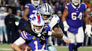 Buffalo Bills quarterback Josh Allen is caught from behind by Dallas Cowboys linebacker Damone Clark 