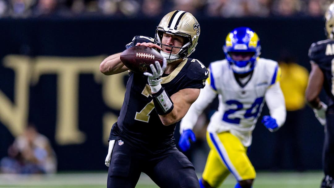 Dec 1, 2024; New Orleans, Louisiana, USA;  New Orleans Saints tight end Taysom Hill (7) catches a pass against the Los Angeles Rams during the first half at Caesars Superdome. Mandatory Credit: Stephen Lew-Imagn Images