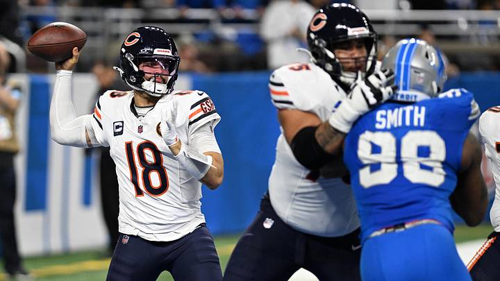 Nov 28, 2024; Detroit, Michigan, USA; Chicago Bears quarterback Caleb Williams (18) throws a pass out of his own end zone against the Detroit Lions in the fourth quarter at Ford Field. Mandatory Credit: Lon Horwedel-Imagn Images
