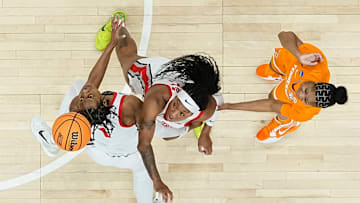 Ohio State Buckeyes forward Ajae Petty (1) and forward Cotie McMahon (32) defend Tennessee Lady Vols guard Jewel Spear (0) during the second round of the women's NCAA Tournament at Value City Arena in Columbus on March 23, 2025. Ohio State lost 82-67.