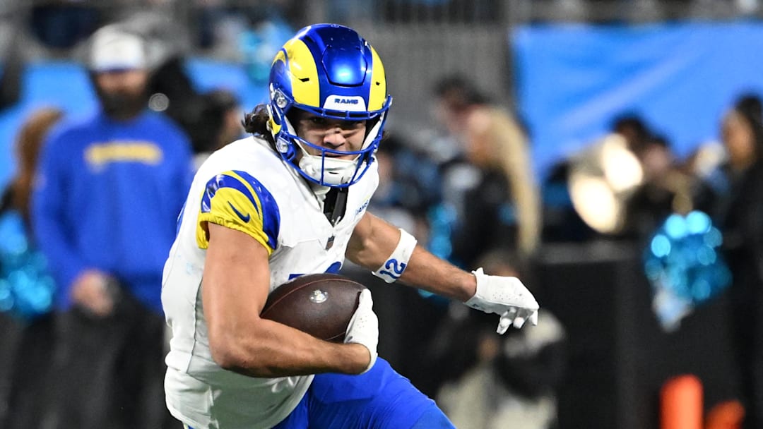 Jan 10, 2026; Charlotte, NC, USA; Los Angeles Rams wide receiver Puka Nacua (12) with the ball in the fourth quarter in an NFC Wild Card Round game at Bank of America Stadium. 