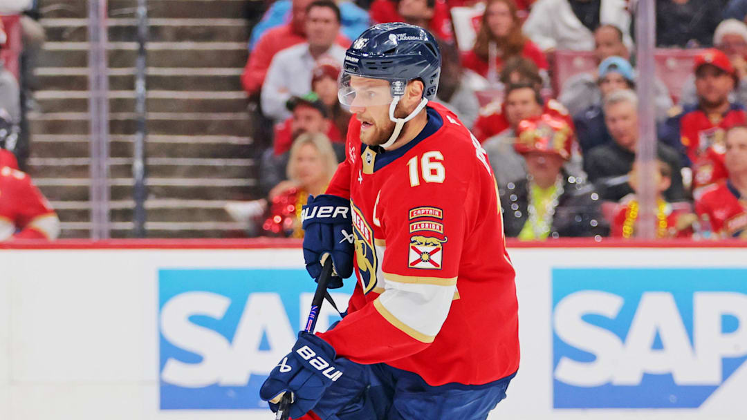 May 26, 2025; Sunrise, Florida, USA; Florida Panthers center Aleksander Barkov (16) controls the puck during the first period against the Carolina Hurricanes in game four of the Eastern Conference Final of the 2025 Stanley Cup Playoffs at Amerant Bank Arena. Mandatory Credit: Sam Navarro-Imagn Images May 26, 2025; Sunrise, Florida, USA; Florida Panthers center Aleksander Barkov (16) controls the puck during the first period against the Carolina Hurricanes in game four of the Eastern Conference Final of the 2025 Stanley Cup Playoffs at Amerant Bank Arena. Mandatory Credit: Sam Navarro-Imagn Images