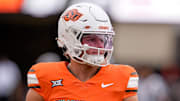 Oklahoma State quarterback Hauss Hejny (8) warms up before an NCAA football game between Oklahoma State (OSU) and UT Martin in Stillwater, Okla., on Thursday, Aug. 28, 2025.