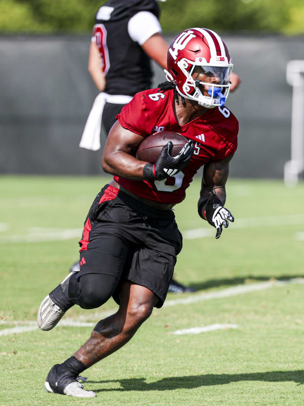 Indiana running back Justice Ellison runs the ball during a fall practice drill on July 31, 2024.