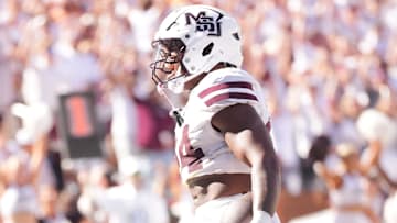 Mississippi State running back Fluff Bothwell (24) celebrates a touchdown during a college football game between Tennessee and Mississippi State at Davis Wade Stadium in Starkville, Miss., on Sept. 27, 2025.