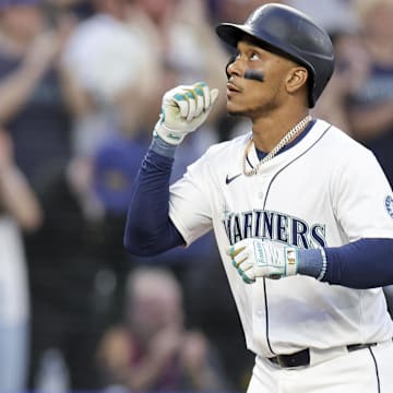 Seattle Mariners designated hitter Jorge Polanco (7) reacts after hitting a solo-home run during the fourth inning of an MLB game against the Miami Marlins at T-Mobile Park on April 26.