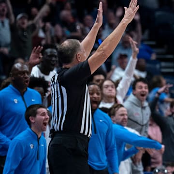 Mississippi Rebels guard Sean Pedulla (3) celebrates his game-winning shot against Arkansas during their second round game of the SEC Men's Basketball Tournament at Bridgestone Arena in Nashville, Tenn., Thursday, March 13, 2025. The Rebels advanced to the third round with the 83-80 win.