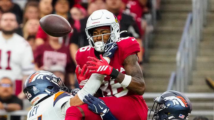 Denver Broncos defensive back Devon Key (26) breaks up a pass intended for Arizona Cardinals wide receiver Jalen Brooks (86) during a game at State Farm Stadium in Glendale, Ariz. on Oct. 24, 2026.