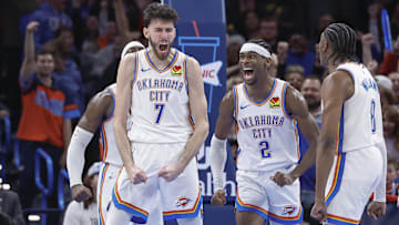 Dec 8, 2023; Oklahoma City, Oklahoma, USA; Oklahoma City Thunder forward Chet Holmgren (7), and guard Shai Gilgeous-Alexander (2) celebrate after Chet Holmgren scores a basket against the Golden State Warriors during the second half at Paycom Center. Mandatory Credit: Alonzo Adams-Imagn Images