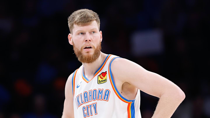 Nov 25, 2023; Oklahoma City, Oklahoma, USA; Oklahoma City Thunder forward Davis Bertans (9) looks up court during a time out against the Philadelphia 76ers during the second half at Paycom Center. Mandatory Credit: Alonzo Adams-Imagn Images